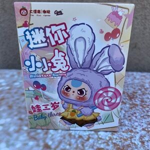 Miniature Bunny Figurine with Lollipop